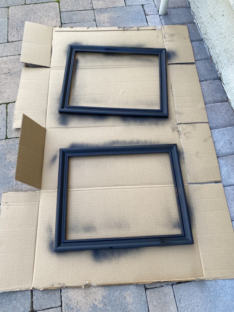 A base layer of lack spray paint on DIY frames helps give an aged look.