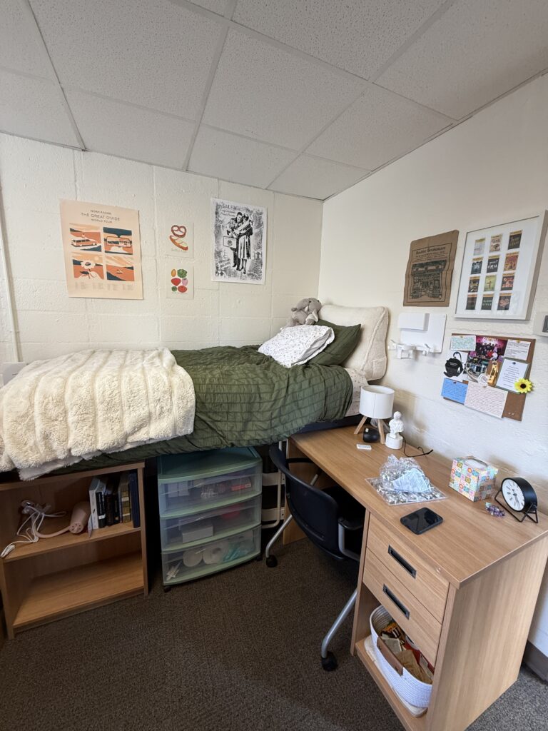 cross-country college move tips showing a cozy college dorm